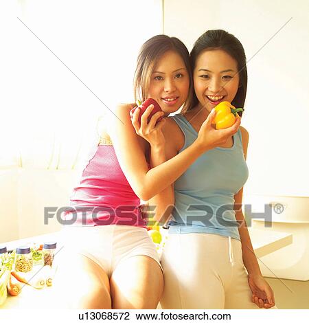 Asian Ethnicity, Casual Clothing, Brown Hair, Adults Only View Large Photo Image Stock Image - Asian Ethnicity, Casual Clothing, Brown Hair, Adults Only. Fotosearch