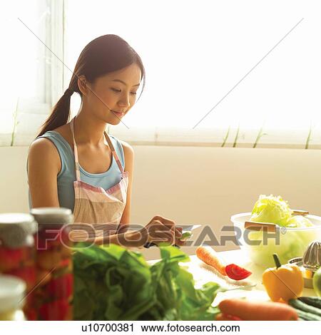 Asian Ethnicity, Casual Clothing, Carrot, Brown Hair, Activity View Large Photo Image Stock Image - Asian Ethnicity, Casual Clothing, Carrot, Brown Hair, Activity. Fotosearch