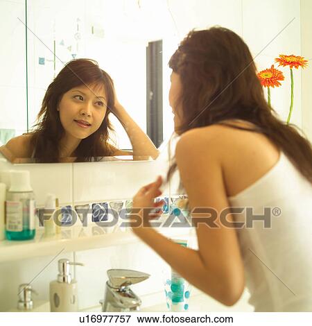 Bathroom, Casual Clothing, Brown Hair, Asian Ethnicity View Large Photo Image Stock Photo - Bathroom, Casual Clothing, Brown Hair, Asian Ethnicity. Fotosearch