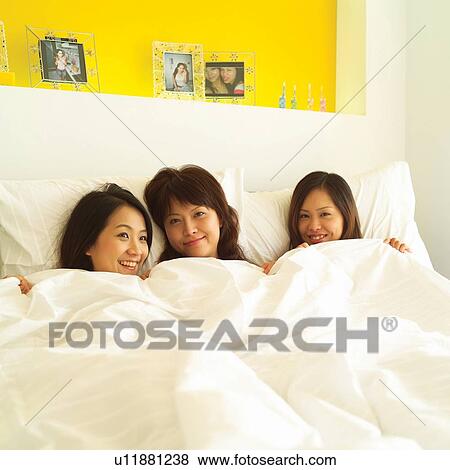 Brown Hair, Asian Ethnicity, Blanket, Bedroom, Bed, Adults Only View Large Photo Image Stock Photo - Brown Hair, Asian Ethnicity, Blanket, Bedroom, Bed, Adults Only. Fotosearch