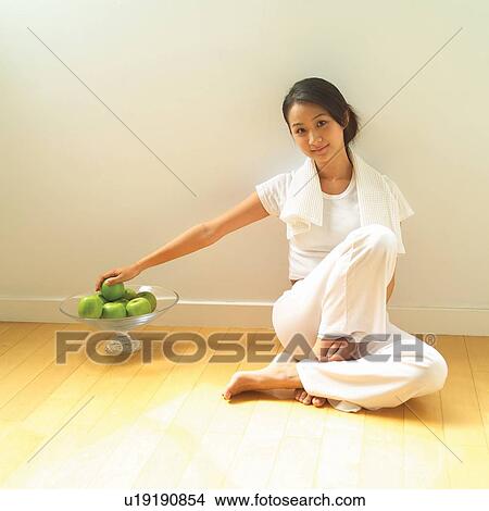 Brown Hair, Fruit, Casual Clothing, Asian Ethnicity View Large Photo Image Picture - Brown Hair, Fruit, Casual Clothing, Asian Ethnicity. Fotosearch