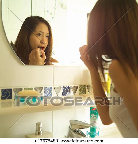 Brown Hair, Square, Girl's Talk, Youth Culture, Tile, Applying View Large Photo Image Stock Photo - Brown Hair, Square, Girl's Talk, Youth Culture, Tile, Applying. Fotosearch
