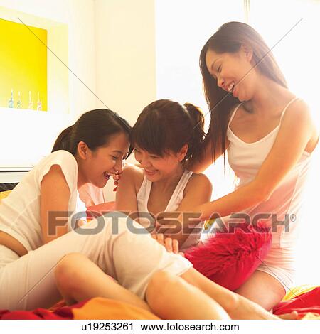 Casual Clothing, Pillow, Waist-Up, Long Hair, Asian Ethnicity View Large Photo Image Stock Image - Casual Clothing, Pillow, Waist-Up, Long Hair, Asian Ethnicity. Fotosearch