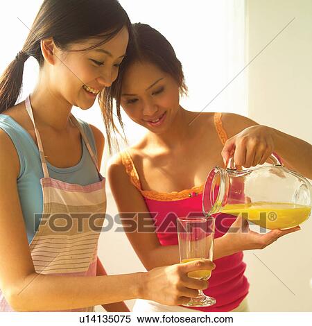 Drinking, Two People, Body Conscious, Smiling, Waist-Up, Indoor View Large Photo Image Stock Photography - Drinking, Two People, Body Conscious, Smiling, Waist-Up, Indoor. Fotosearch