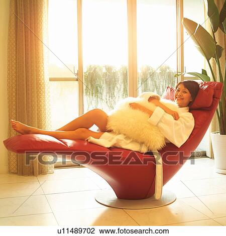 Stock Image - Indoor, Chair, Lifestyles, Body Care, Tiled Floor, House Plant. Fotosearch