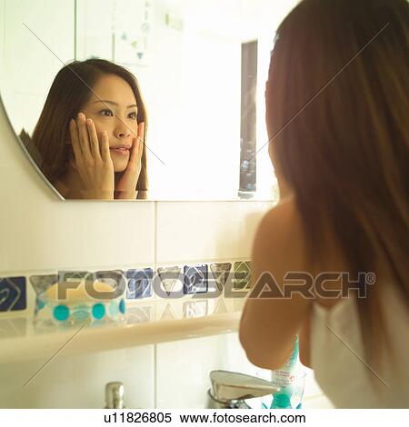 Lifestyles, Bathroom, Human Face, Touching, Head And Shoulders, Indoor, Square View Large Photo Image Stock Photography - Lifestyles, Bathroom, Human Face, Touching, Head And Shoulders, Indoor, Square. Fotosearch