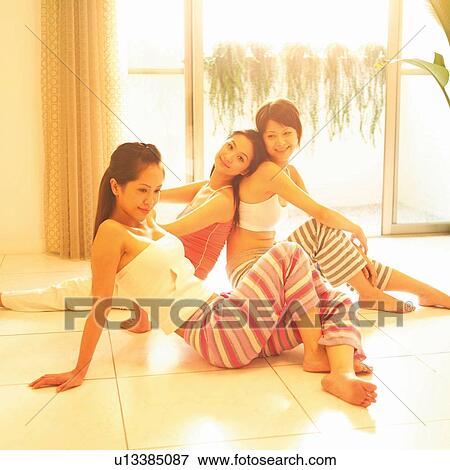 Smiling, Floor, Three People, Window, Long Hair, Looking Sideways View Large Photo Image Stock Photo - Smiling, Floor, Three People, Window, Long Hair, Looking Sideways. Fotosearch
