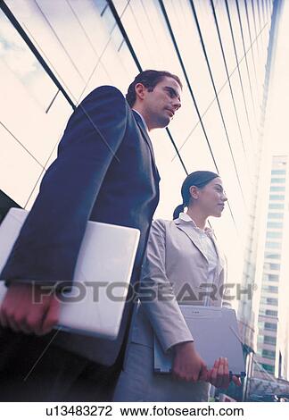 brown hair, buildings, business, carrying View Large Photo Image Stock Image - brown hair, buildings, business, carrying. Fotosearch