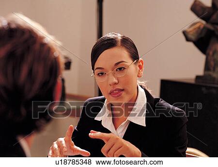 Stock Photo - brown hair, business, close up. Fotosearch