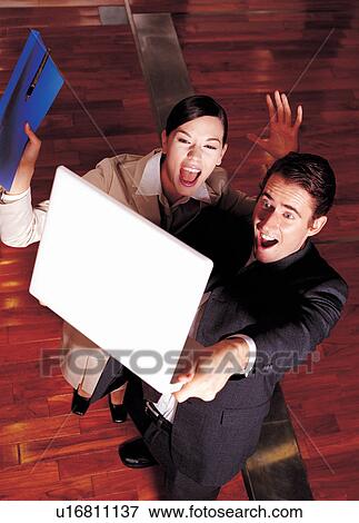 Stock Photo - brown hair, business, corporate. Fotosearch