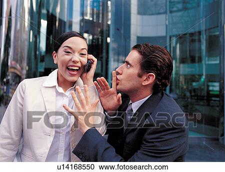 Stock Image - brown hair, mobile phone, shine, jubilant, talking. Fotosearch