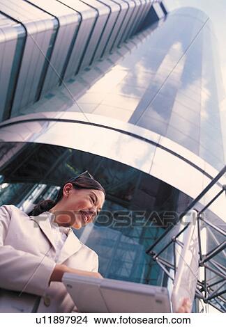 buildings, business, businesswoman View Large Photo Image Picture - buildings, business, businesswoman. Fotosearch