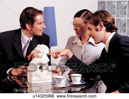Stock Photograph - indoors, occupation, work, laughing, white, 25-35 years. Fotosearch