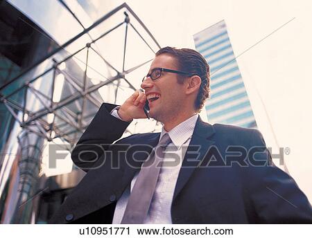 professional, posing, phone, brown hair, communications, outfits, man only View Large Photo Image Stock Image - professional, posing, phone, brown hair, communications, outfits, man only. Fotosearch