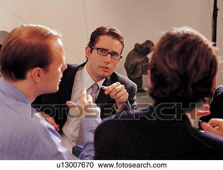 Stock Image - spectacles, white collar, occupation, discussion, work, corporate, skill. Fotosearch