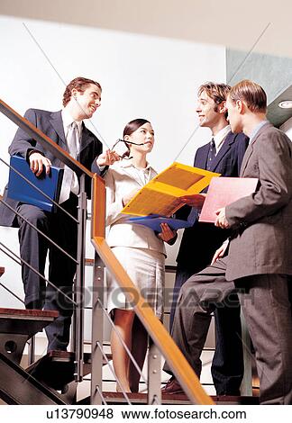 standing, brown hair, employees, well dressed, staircase View Large Photo Image Stock Photo - standing, brown hair, employees, well dressed, staircase. Fotosearch