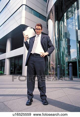 standing, close-up, employee, skill, business, day time, suit View Large Photo Image Stock Photo - standing, close-up, employee, skill, business, day time, suit. Fotosearch