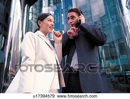 white collar, corporate, daytime, employee, cell phone, buildings, together View Large Photo Image Stock Photo - white collar, corporate, daytime, employee, cell phone, buildings, together. Fotosearch