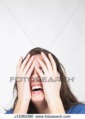 Woman hiding her eyes with hands View Large Photo Image Stock Image - Woman hiding her eyes with hands. Fotosearch
