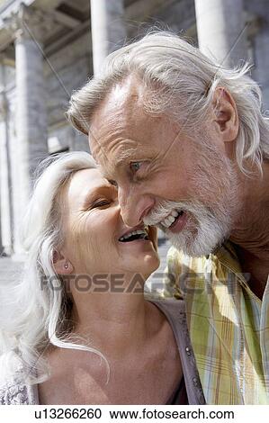 Woman kissing man View Large Photo Image Stock Image - Woman kissing man. Fotosearch