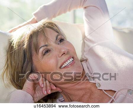 Picture - Woman Relaxing At Home. Fotosearch