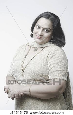 Stock Photograph - Portrait of a mature woman smiling. Fotosearch