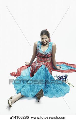 Stock Photography - Portrait of a young woman smiling. Fotosearch