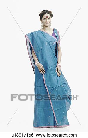 Stock Photograph - Portrait of a young woman wearing a sari. Fotosearch