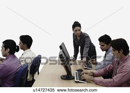 Stock Photography - Businesswoman giving a presentation. Fotosearch