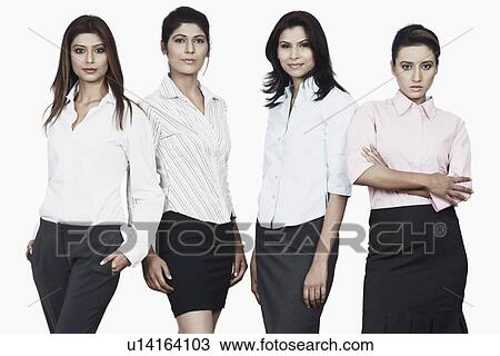 Stock Image - Portrait of four businesswomen standing. Fotosearch