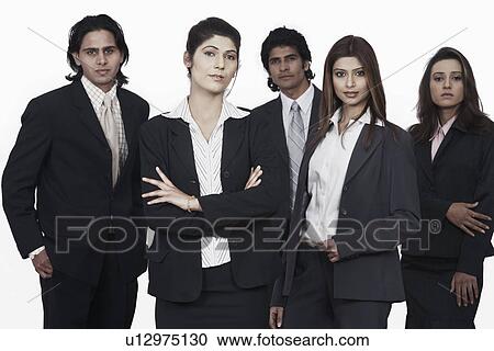 Stock Image - Portrait of three businesswomen and two businesswomen smiling. Fotosearch