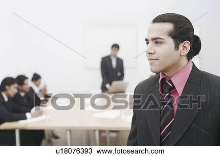 Close-up of a businessman View Large Photo Image Stock Image - Close-up of a businessman. Fotosearch