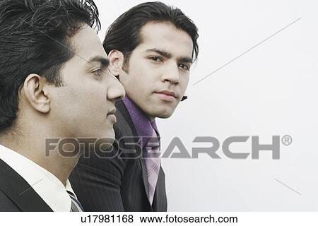 Close-up of two businessmen View Large Photo Image Stock Photo - Close-up of two businessmen. Fotosearch