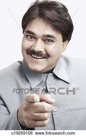 Stock Photograph - Portrait of a businessman gesturing. Fotosearch