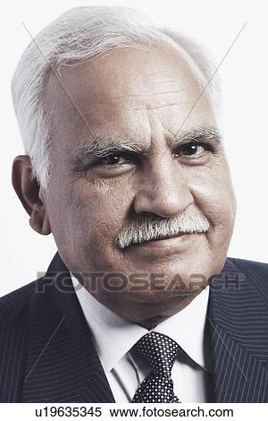 Portrait of a businessman View Large Photo Image Stock Photography - Portrait of a businessman. Fotosearch