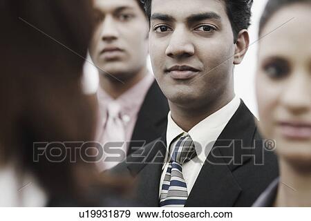 Stock Photo - Portrait of a businessman smiling. Fotosearch