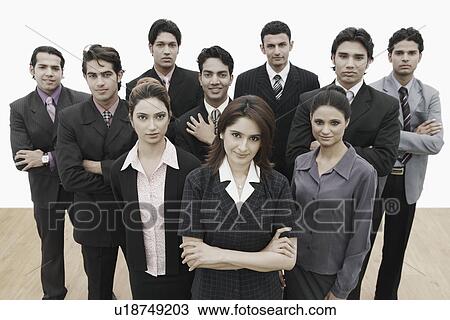 Stock Image - Portrait of a group of business executives standing together. Fotosearch