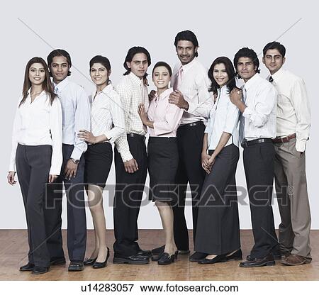 Portrait of a group of business executives smiling View Large Photo Image Stock Photo - Portrait of a group of business executives smiling. Fotosearch