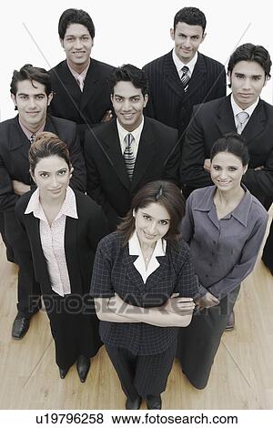 High angle view of a group of business executives smiling View Large Photo Image Stock Photo - High angle view of a group of business executives smiling. Fotosearch