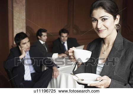 Stock Photography - Portrait of a businesswoman smiling. Fotosearch