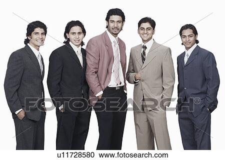 Portrait of five businessmen standing with their hands in their pockets View Large Photo Image Stock Image - Portrait of five businessmen standing with their hands in their pockets. Fotosearch