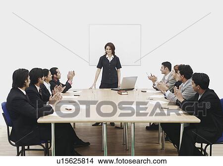 Business executives applauding at a presentation View Large Photo Image Picture - Business executives applauding at a presentation. Fotosearch