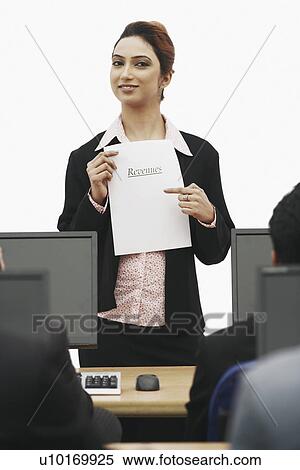 Portrait of a businesswoman giving a presentation View Large Photo Image Stock Photography - Portrait of a businesswoman giving a presentation. Fotosearch