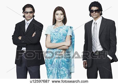 Portrait of a businesswoman with two businessmen View Large Photo Image Stock Photo - Portrait of a businesswoman with two businessmen. Fotosearch