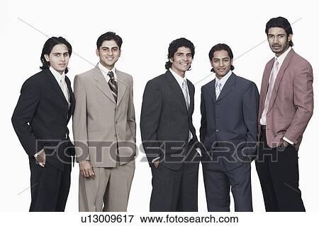Portrait of five businessmen standing with their hands in their pockets View Large Photo Image Stock Photo - Portrait of five businessmen standing with their hands in their pockets. Fotosearch