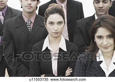 Portrait of two businesswomen standing together View Large Photo Image Stock Photography - Portrait of two businesswomen standing together. Fotosearch