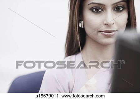 Stock Image - Close-up of a businesswoman. Fotosearch