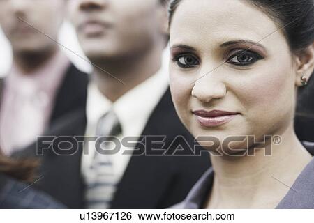Portrait of a businesswoman smiling View Large Photo Image Stock Photograph - Portrait of a businesswoman smiling. Fotosearch