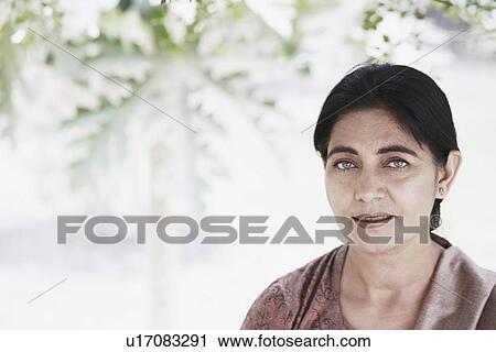 Stock Image - Portrait of a mature woman. Fotosearch