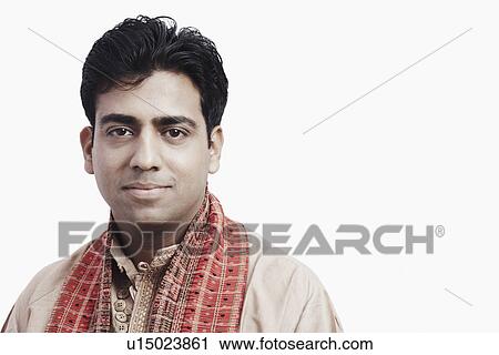 Portrait of a young man wearing traditional clothing View Large Photo Image Stock Image - Portrait of a young man wearing traditional clothing. Fotosearch